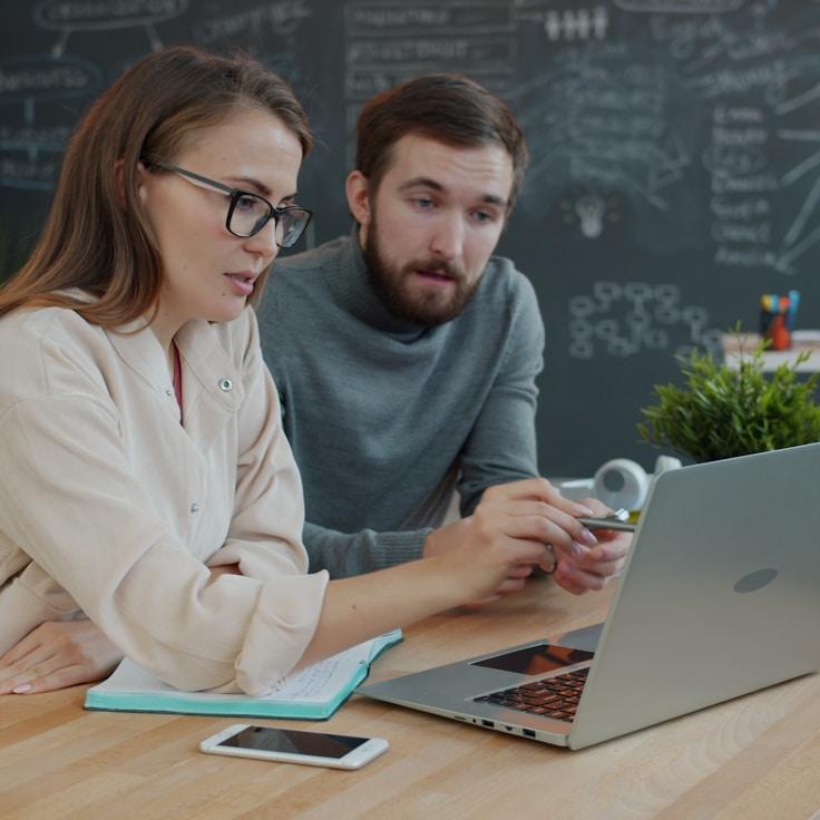 Mobile app project planning workspace with devices and development tools